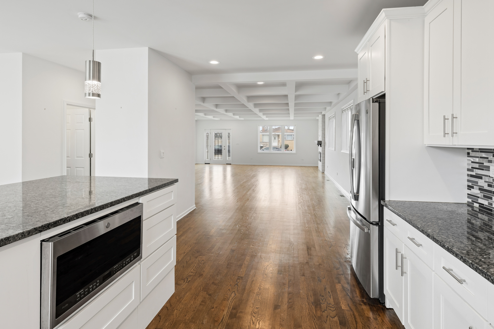 1823 35th Avenue Stone Park, IL 60165 - Photo 14 of 44 a view of a kitchen with wooden floor and electronic appliances