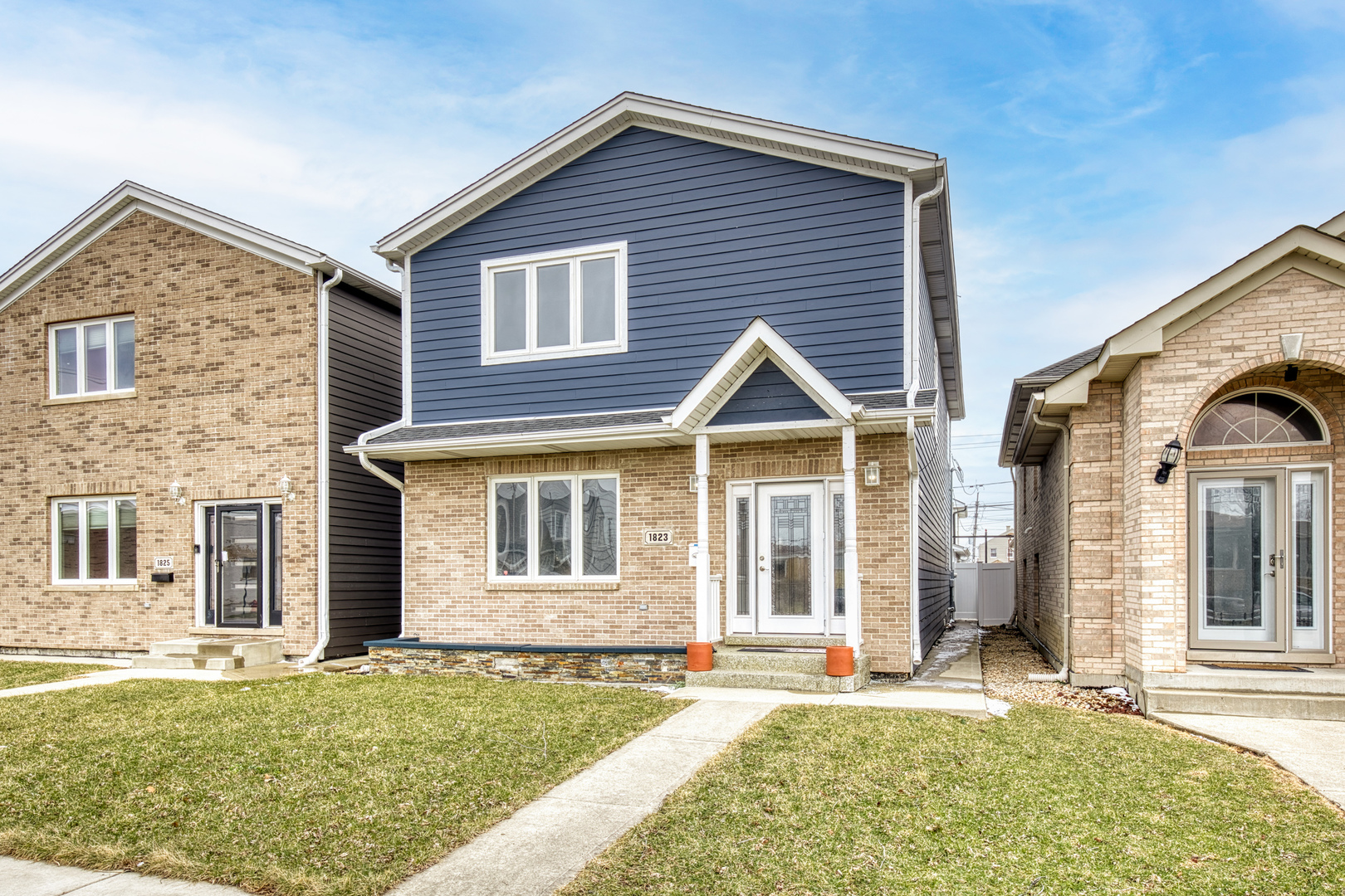 1823 35th Avenue Stone Park, IL 60165 - Photo 2 of 44 front view of a house with a yard