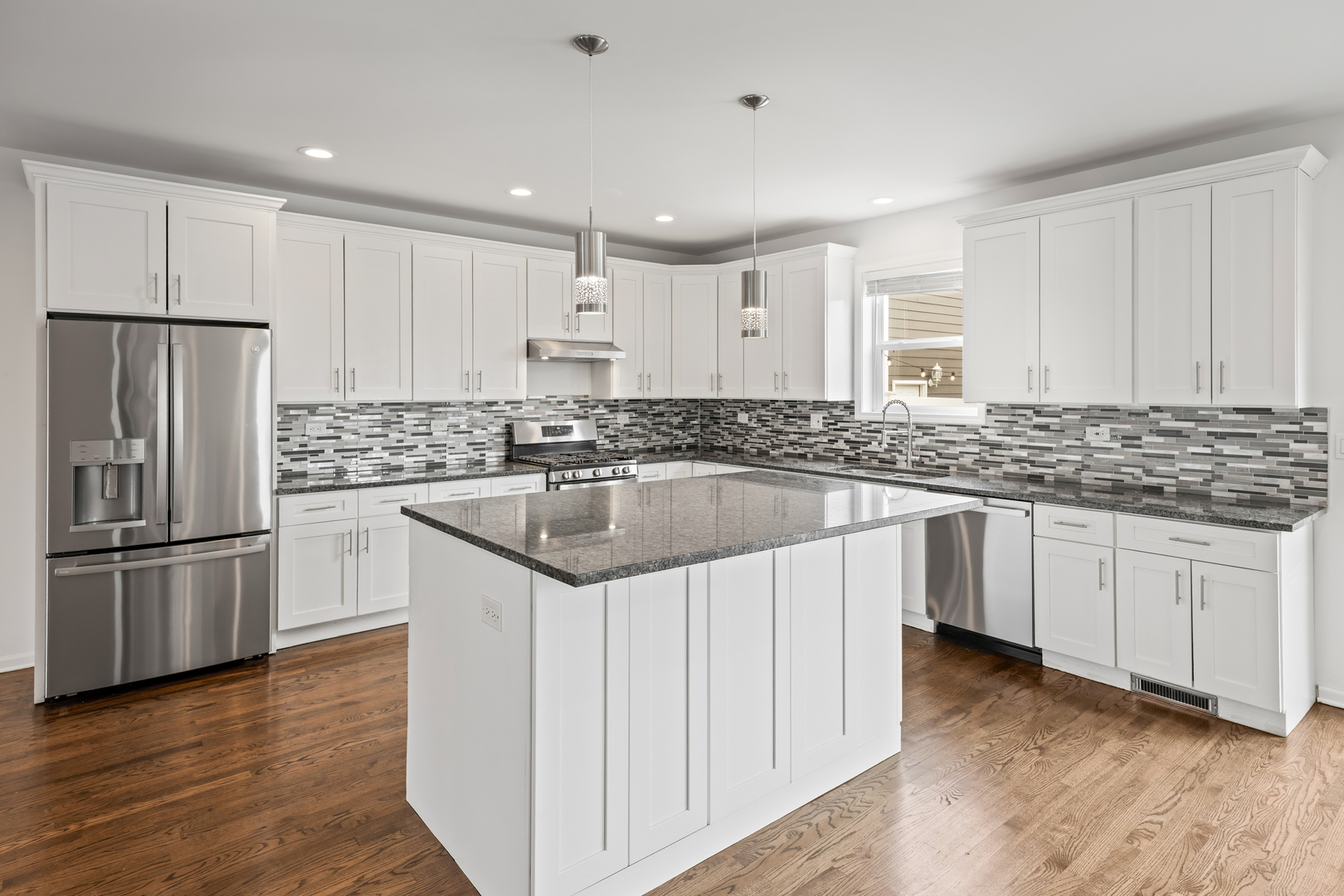 1823 35th Avenue Stone Park, IL 60165 - Photo 10 of 44 a kitchen with granite countertop a sink stove and refrigerator