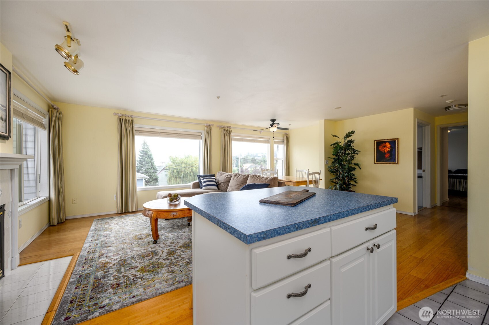 910 34th Street, Unit 202 Anacortes, WA 98221 - Photo 8 of 20 a view of a kitchen counter top space with granite countertop living room