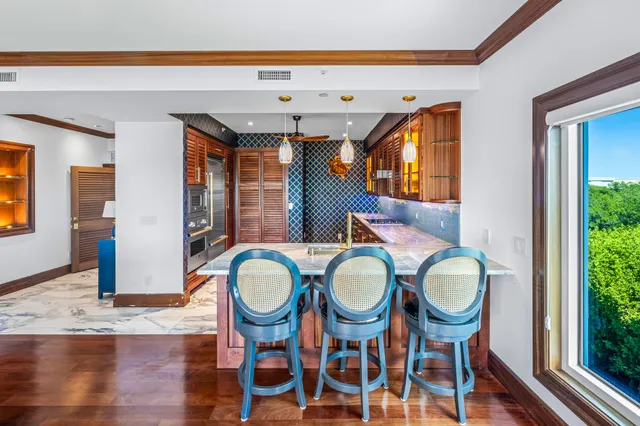 a view of a chairs and table on the terrace
