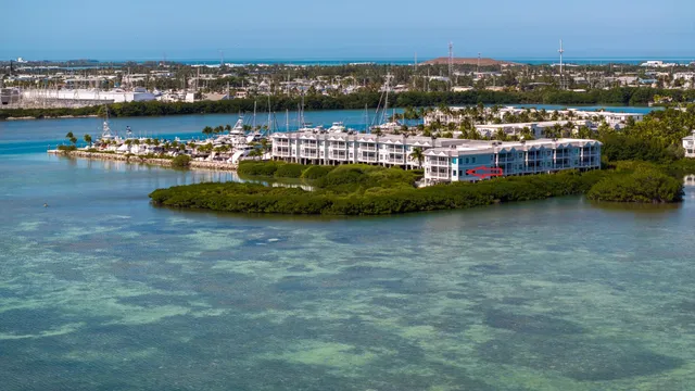 a view of a house with outdoor space and lake view
