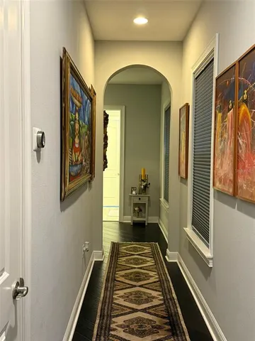 a en suite bathroom with a sink and a mirror