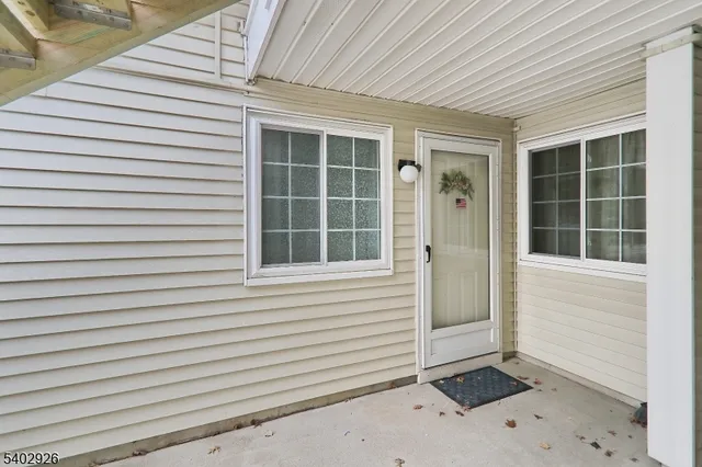a view of a house with white door