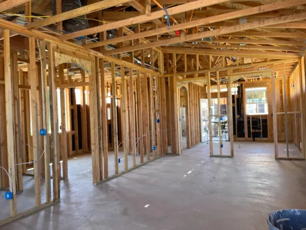 a view of a room with wooden walls