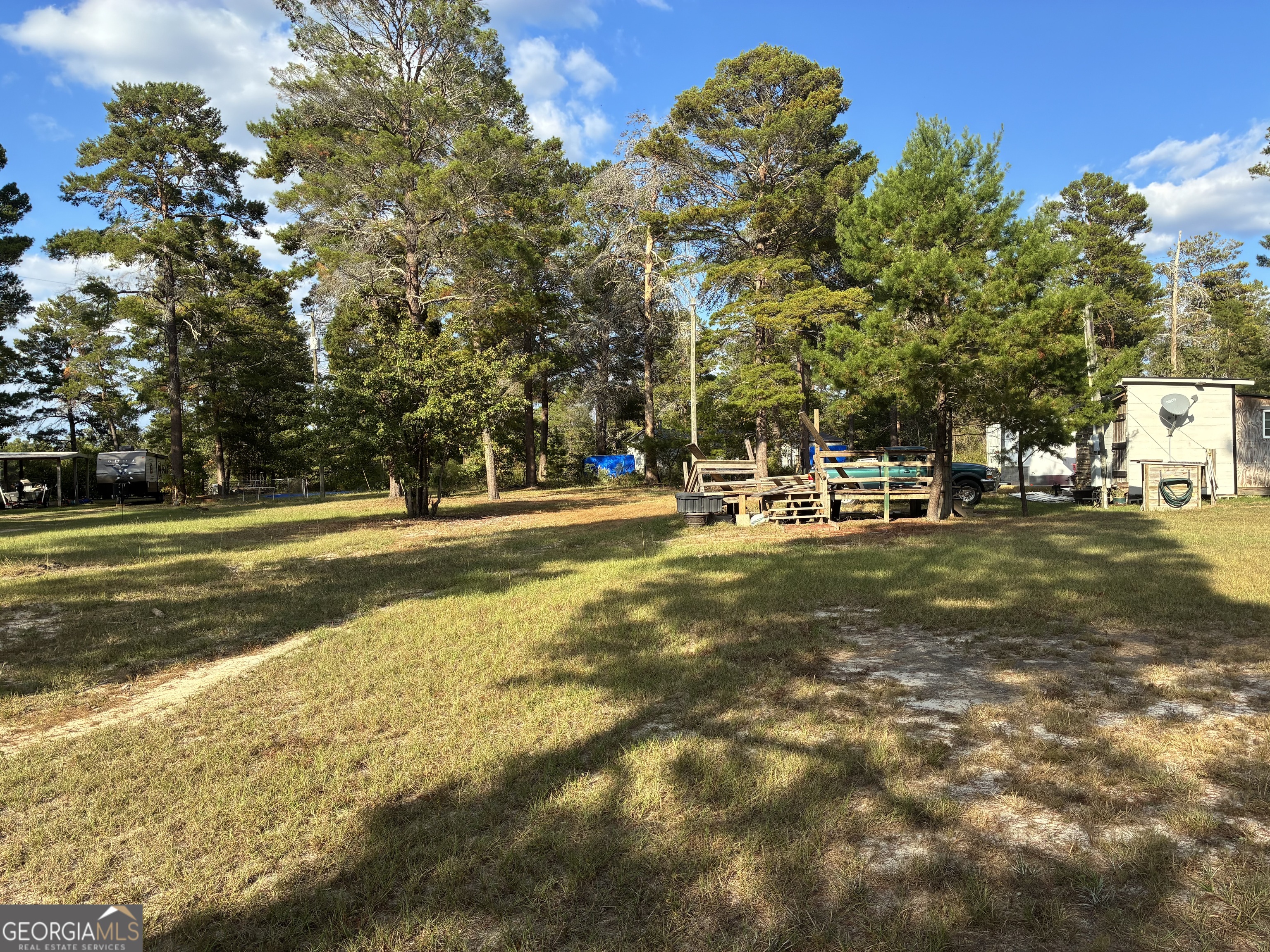 191 Rowell Road Roberta, GA 31078 - Photo 4 of 4 a view of a playground with basketball court