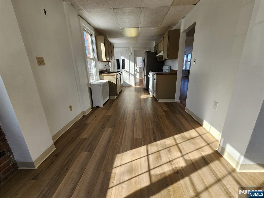 752 Ridge Road Lyndhurst, NJ 07071 - Photo 11 of 19 a view of a kitchen with wooden floor and electronic appliances