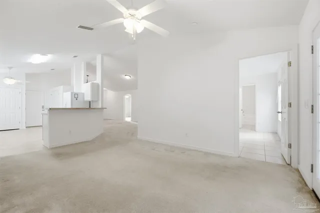 a view of a kitchen with a sink