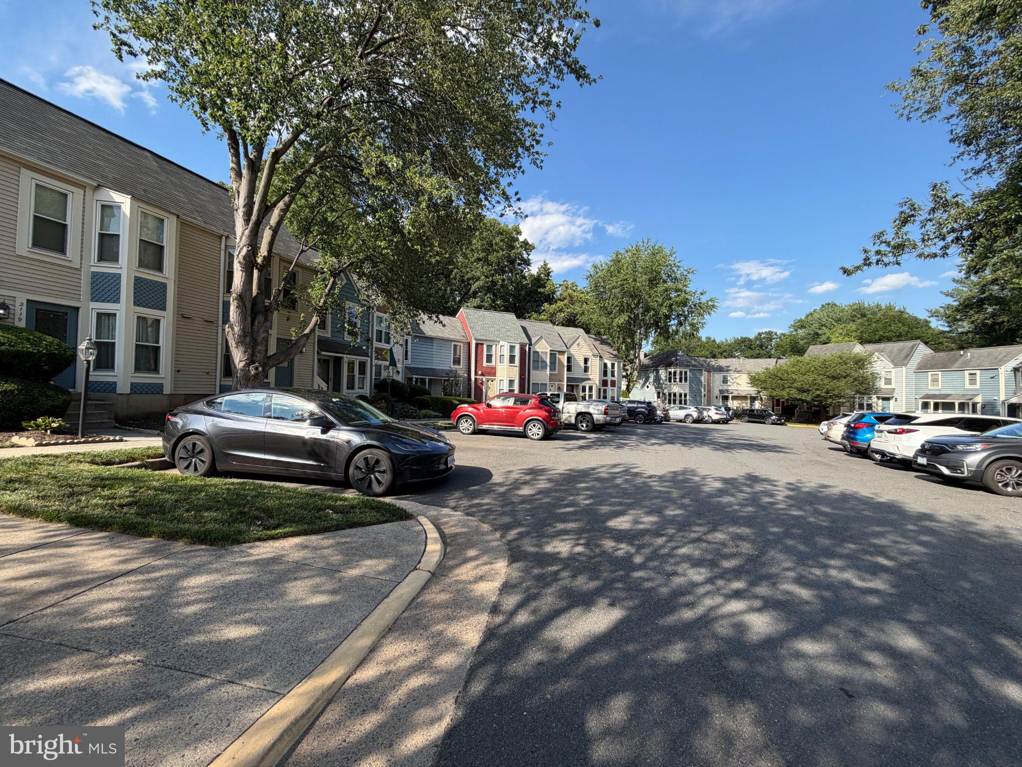 2121 Whisper Way Reston, VA 20191 - Photo 46 of 61 Charming neighborhood under blue skies.