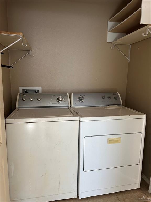 3800 South Sheraton Avenue Pharr, TX 78577 - Photo 9 of 11 a utility room with dryer and washer