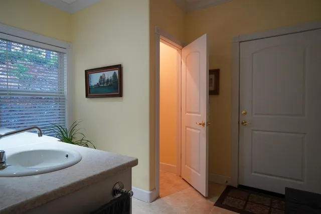 a view of house with yard and entertaining space