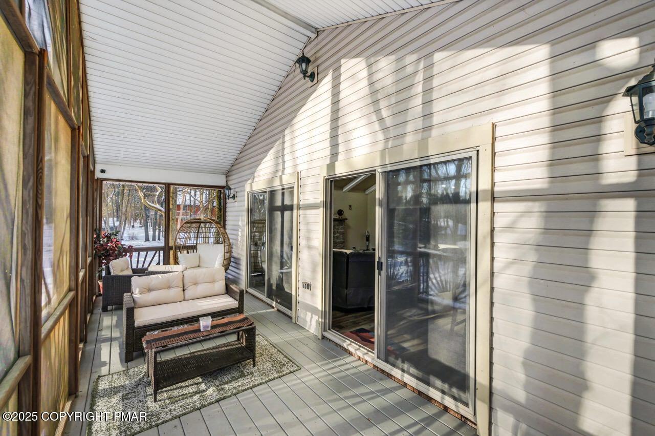 124 Fern Ridge Road Blakeslee, PA 18610 - Photo 23 of 69 Screened deck off Living area