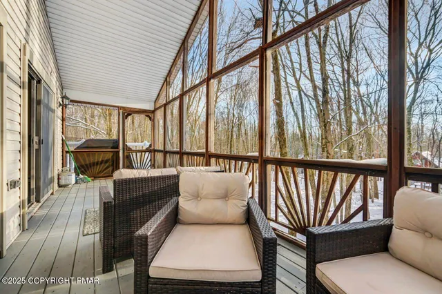 a bedroom with a bed and a mirror