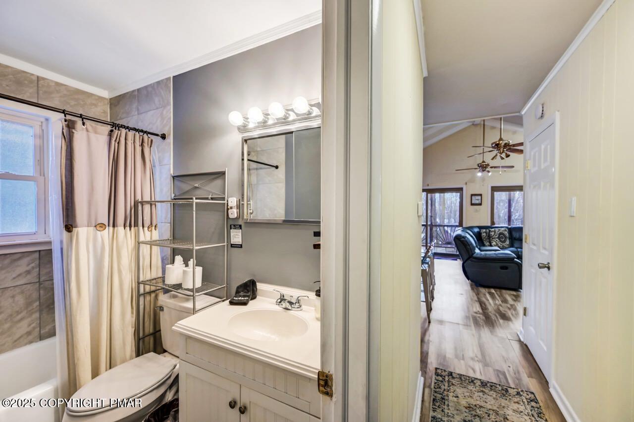 124 Fern Ridge Road Blakeslee, PA 18610 - Photo 29 of 69 a bathroom with a sink toilet and shower