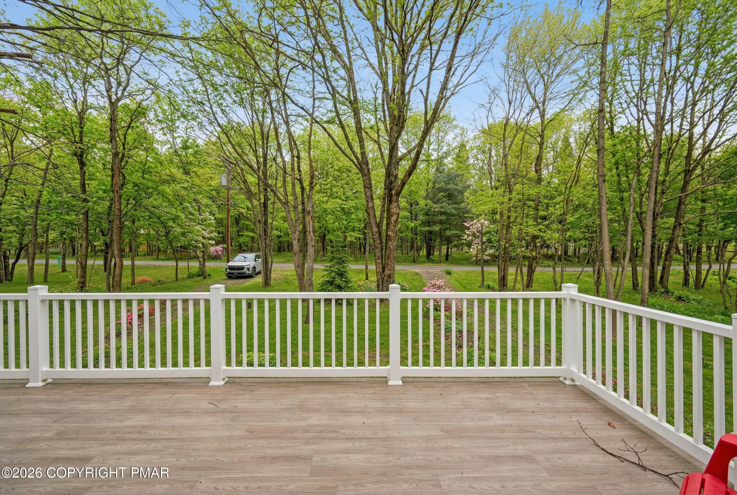 124 Fern Ridge Road Blakeslee, PA 18610 - Photo 30 of 69 Street side Balcony Deck