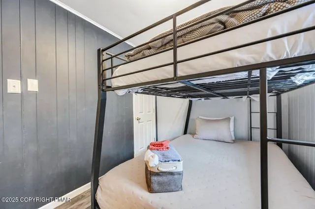 a view of a park with trees on the side of the road