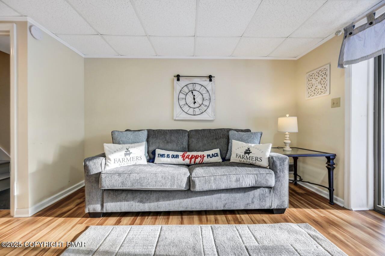124 Fern Ridge Road Blakeslee, PA 18610 - Photo 42 of 69 a bedroom with a bed and wooden floor