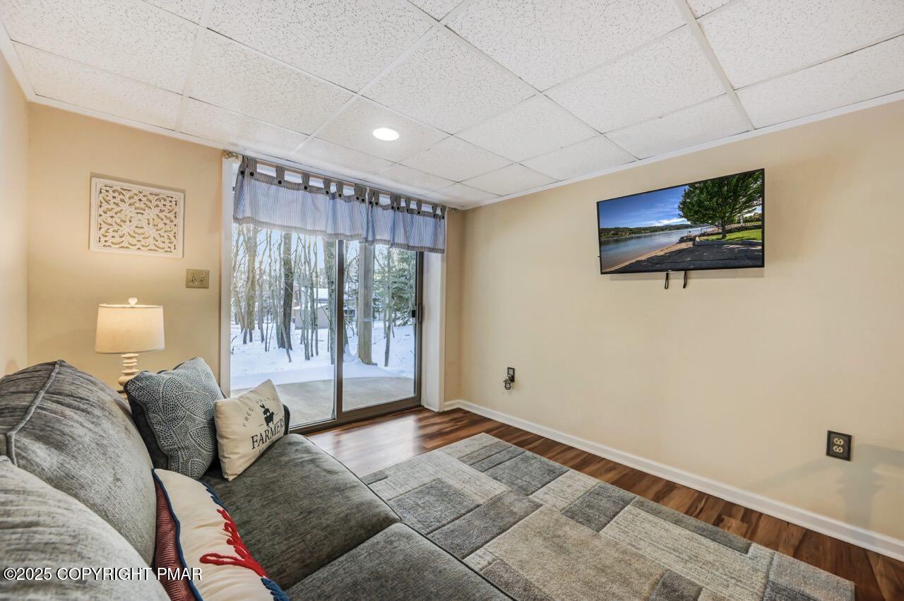 124 Fern Ridge Road Blakeslee, PA 18610 - Photo 44 of 69 a bedroom with furniture and a flat screen tv