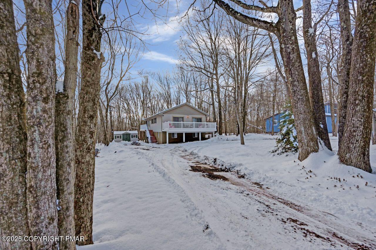124 Fern Ridge Road Blakeslee, PA 18610 - Photo 62 of 69 a view of a covered with snow in the backyard