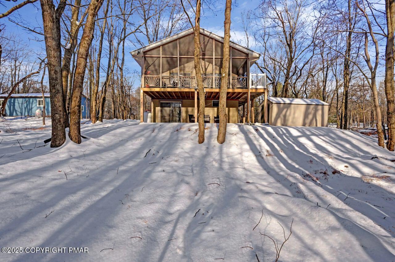 124 Fern Ridge Road Blakeslee, PA 18610 - Photo 65 of 69 a view of house with backyard and trees
