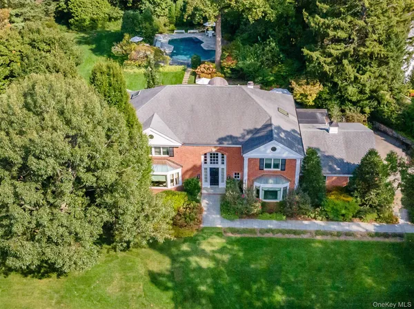 an aerial view of a house with a garden
