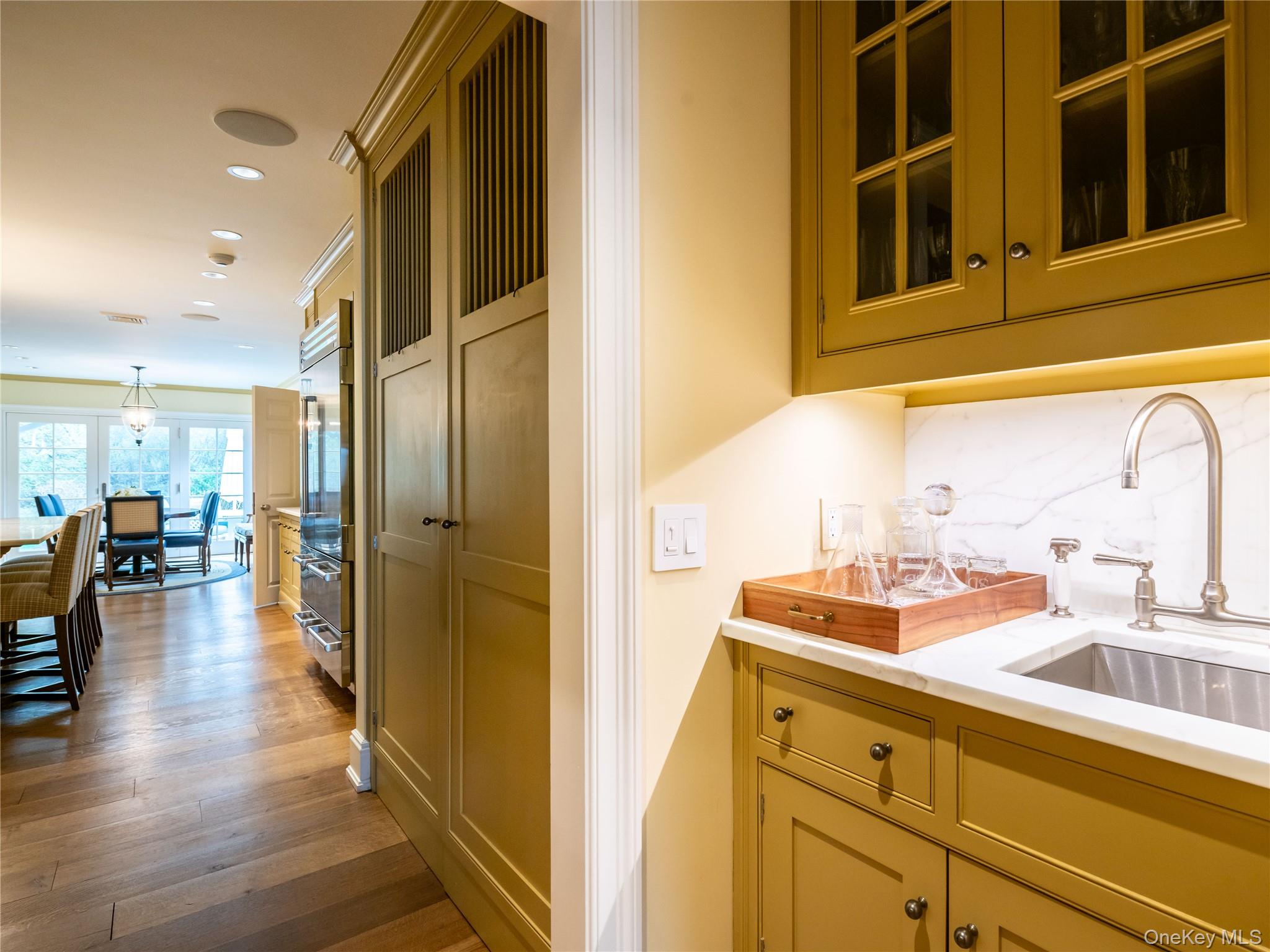 90 Elderfields Road Manhasset, NY 11030 - Photo 11 of 35 a bathroom with a sink and a mirror