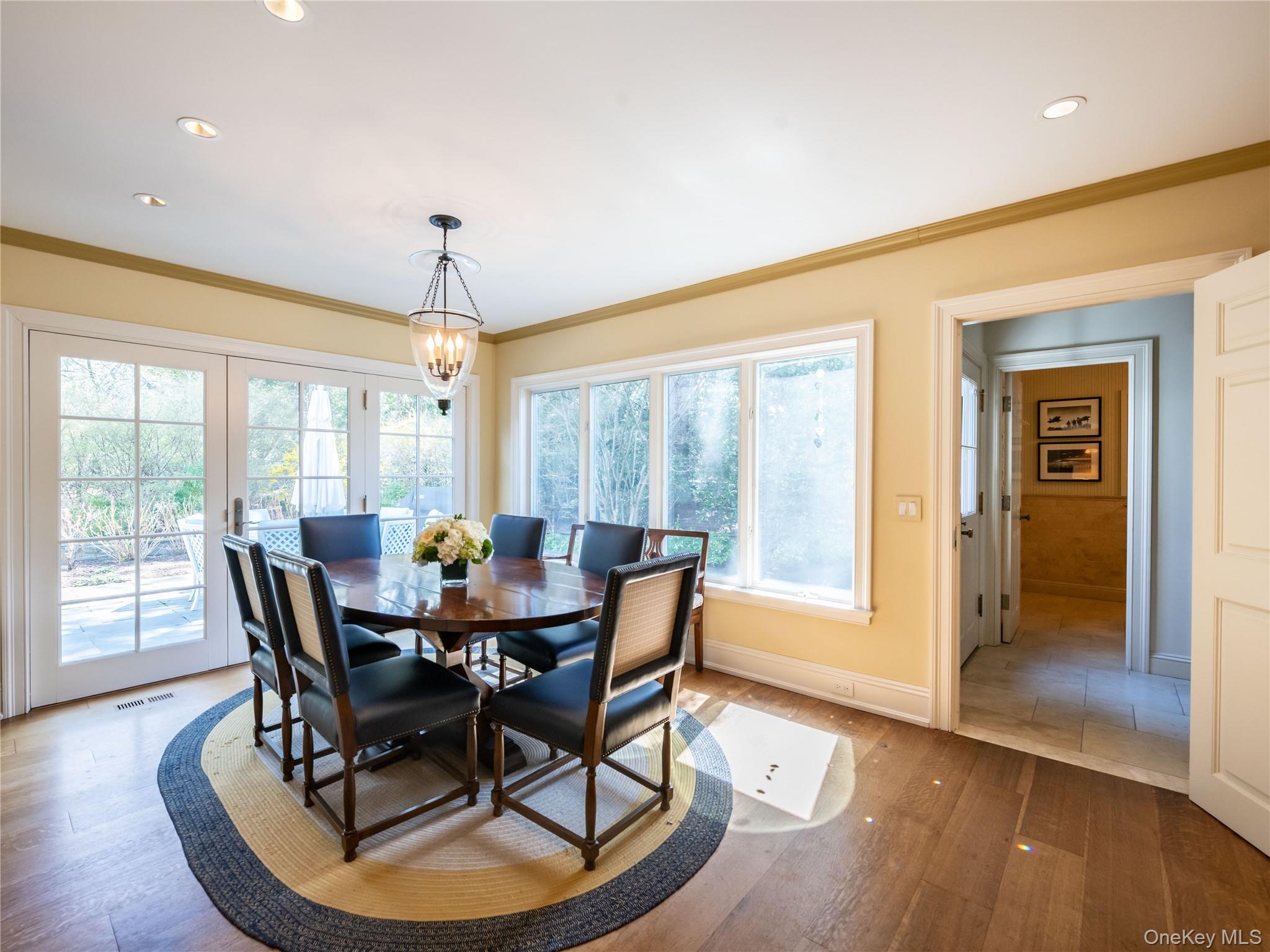 90 Elderfields Road Manhasset, NY 11030 - Photo 15 of 35 a dining room with furniture window wooden floor