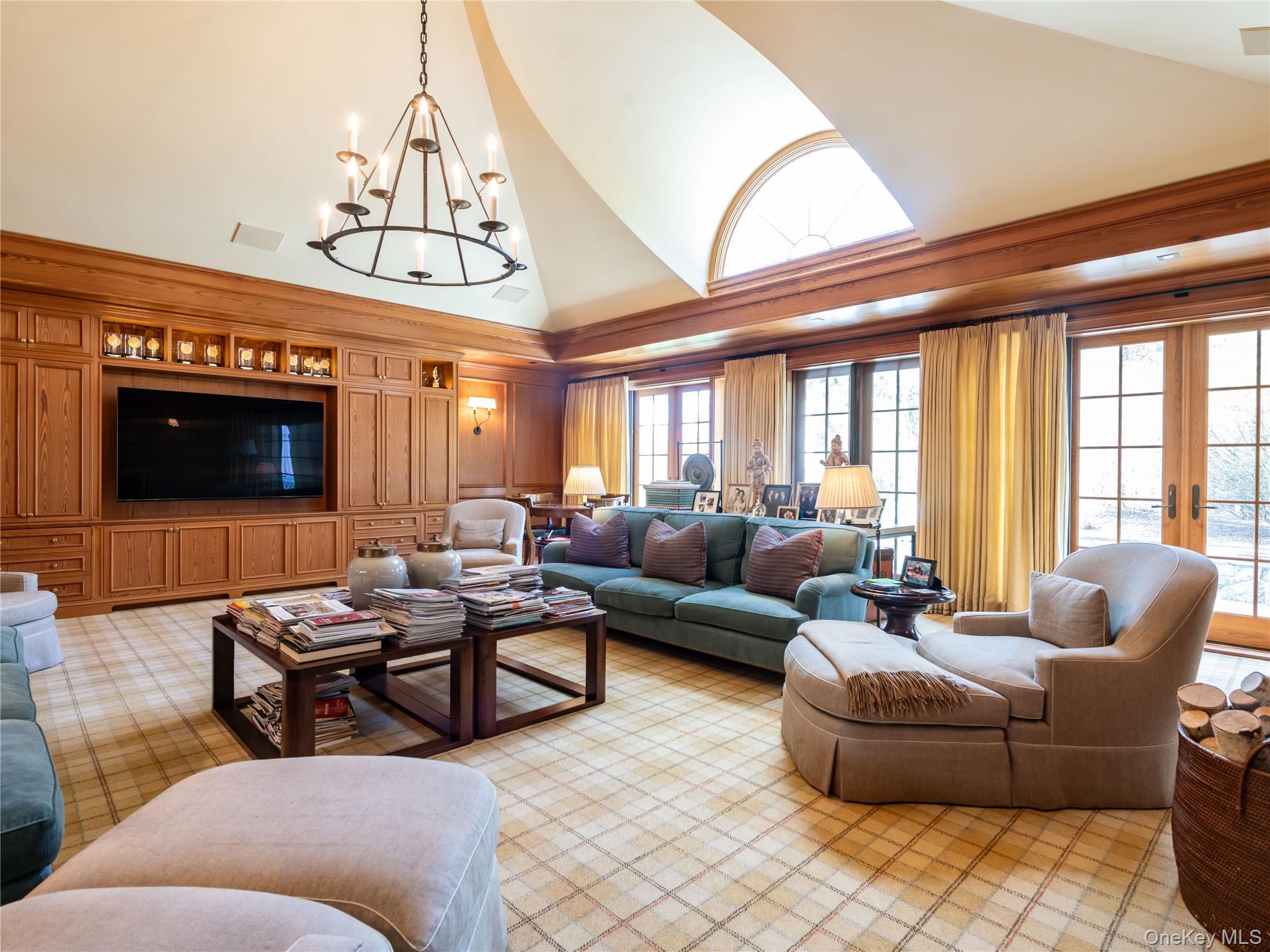 90 Elderfields Road Manhasset, NY 11030 - Photo 18 of 35 a living room with furniture and a fireplace