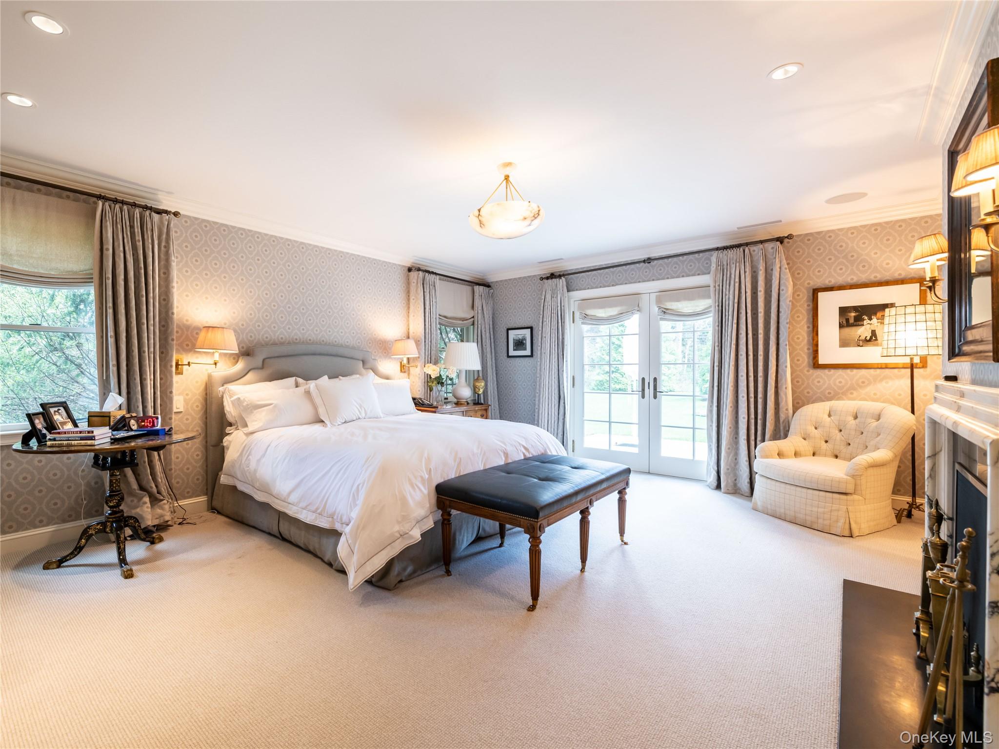 90 Elderfields Road Manhasset, NY 11030 - Photo 23 of 35 a bedroom with a bed couch and a window