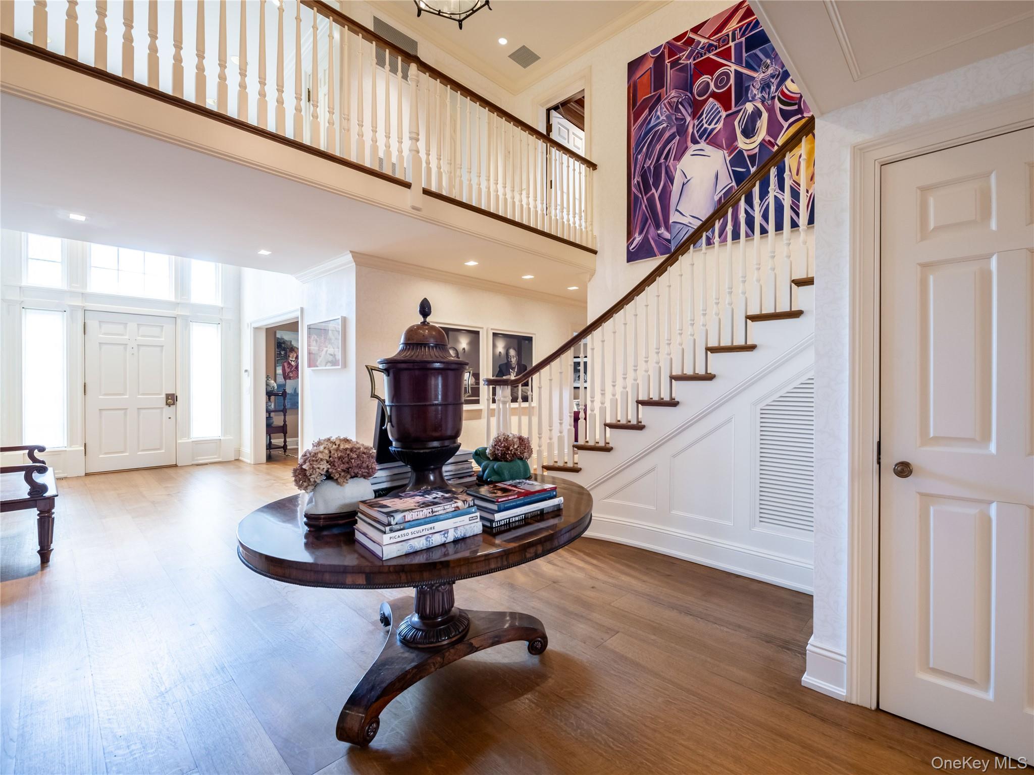 90 Elderfields Road Manhasset, NY 11030 - Photo 5 of 35 a view of entryway and hall with wooden floor