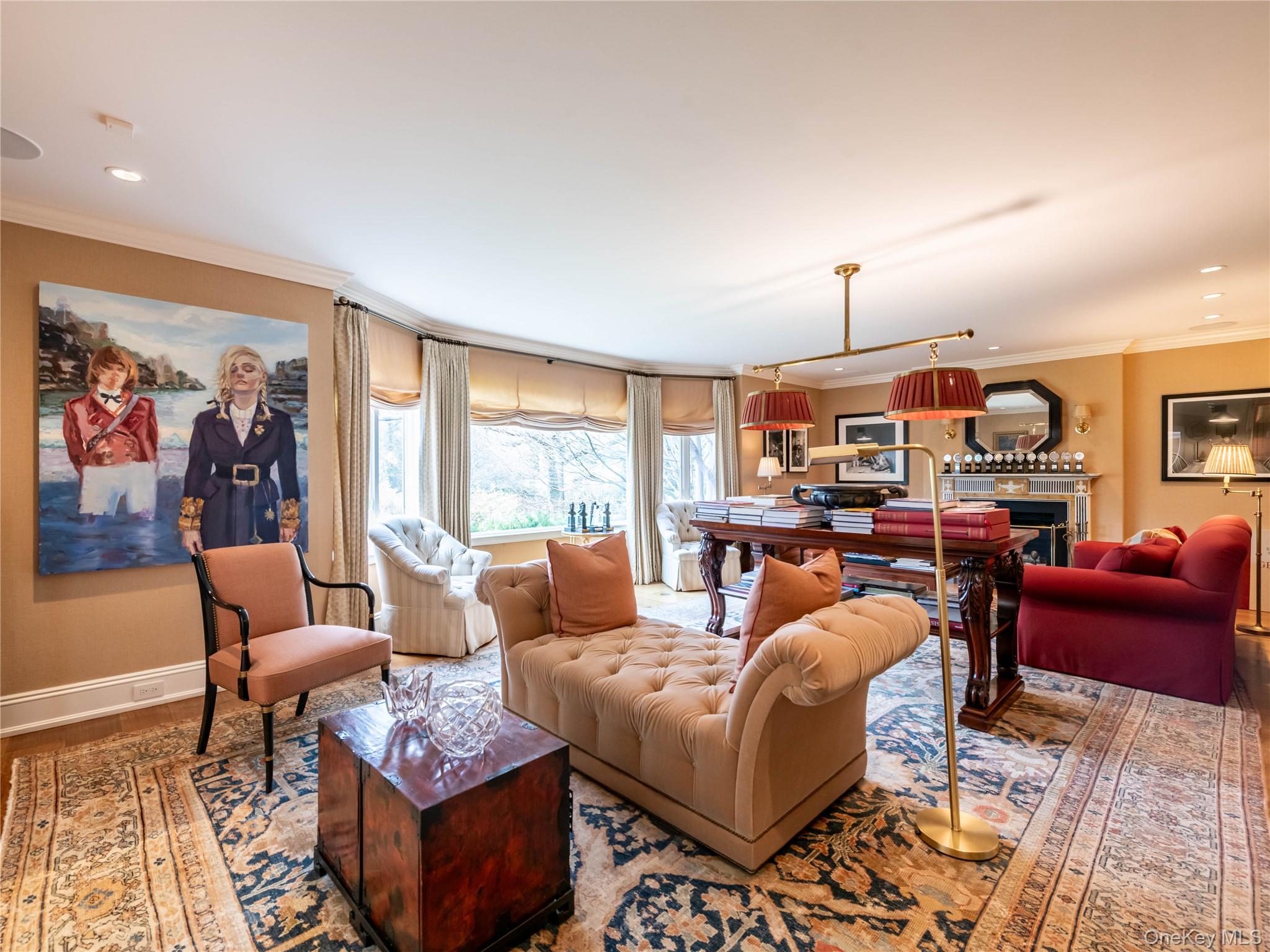 90 Elderfields Road Manhasset, NY 11030 - Photo 7 of 35 a living room with furniture a fireplace and a floor to ceiling window