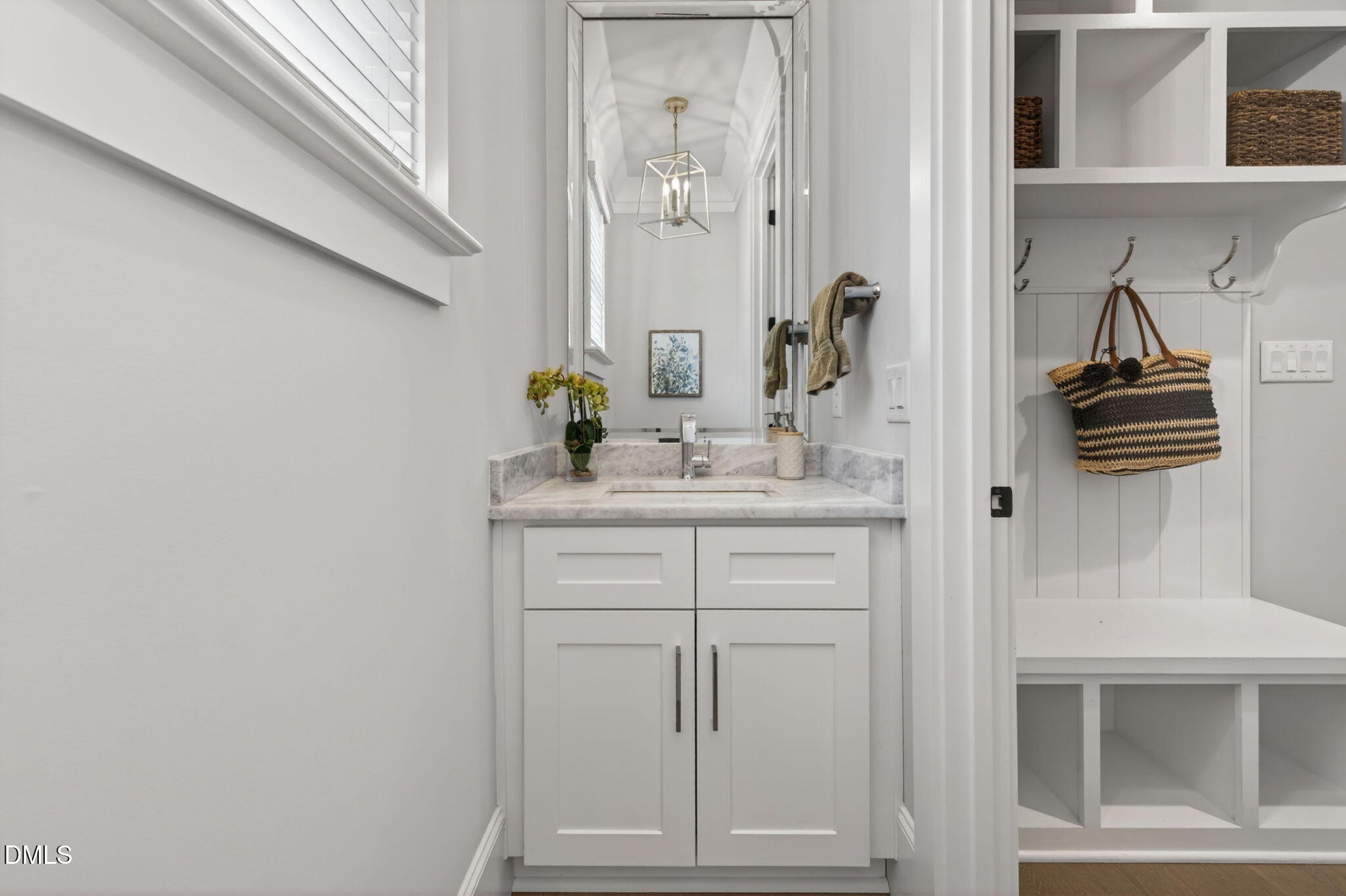 3417 Edgemont Drive Raleigh, NC 27612 - Photo 27 of 83 a bathroom with a sink and a mirror