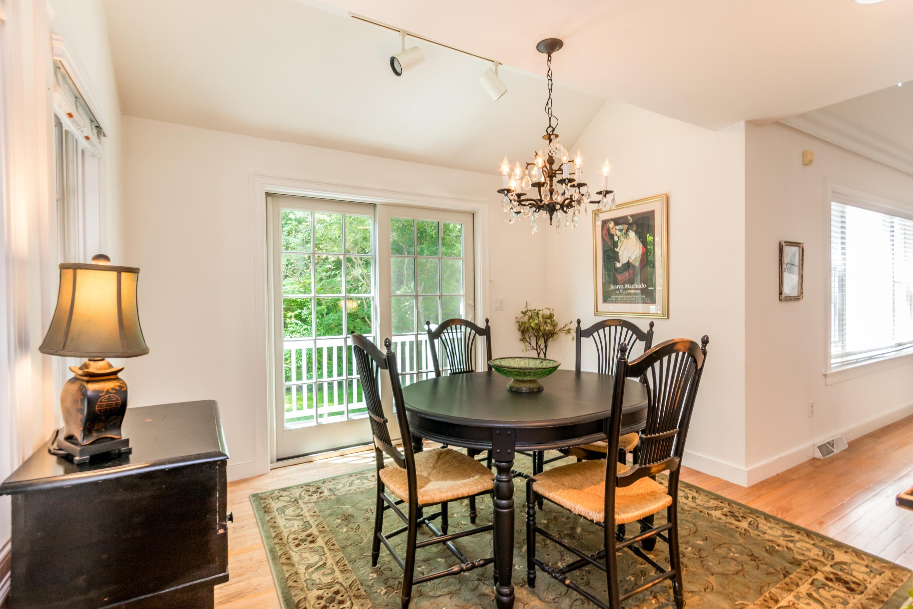 15 Hampton Court, Unit 15 Mashpee, MA 02649 - Photo 12 of 40 Formal dining with slider to deck