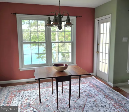 a table that has a table and chairs in it