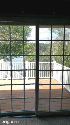 a view of a glass door with a balcony