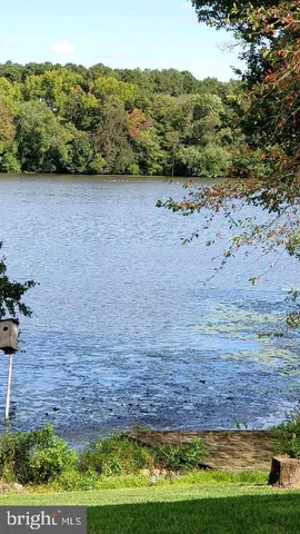 a view of a field with an outdoor space