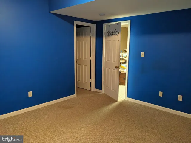 a bathroom with a sink a mirror and a shower