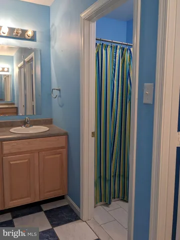 a bathroom with a toilet and a sink