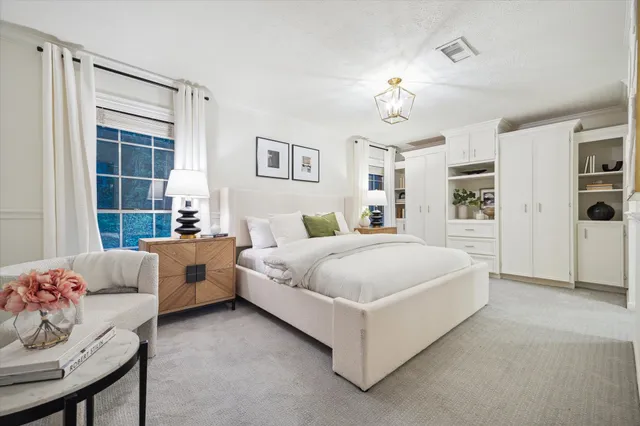 a view of a bathroom from a hallway