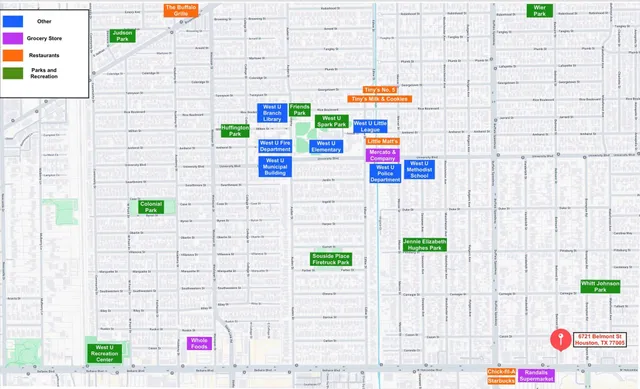 a view of a brick house with a large trees