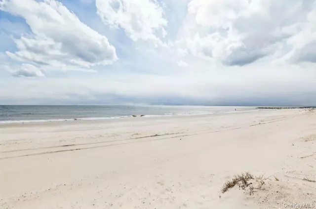 a view of swimming pool from a balcony