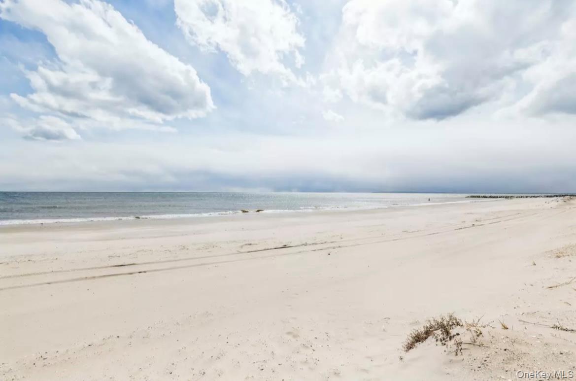 133 Beach 120th Street, Unit 2C Queens, NY 11694 - Photo 12 of 13 a view of beach and ocean