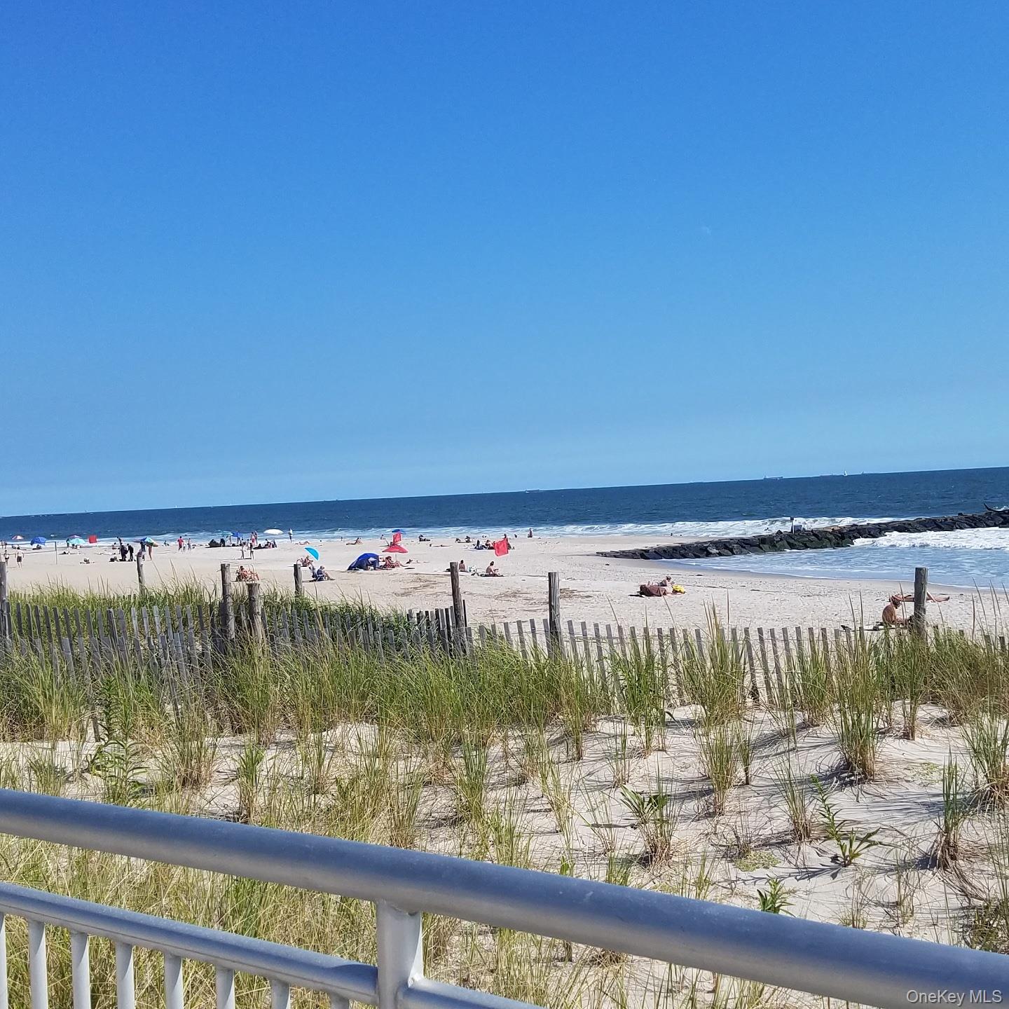 133 Beach 120th Street, Unit 2C Queens, NY 11694 - Photo 13 of 13 a view of swimming pool from a balcony