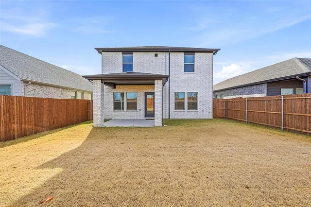 a picture of a bench in front of a wall