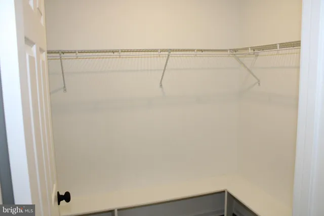 a view of small space with racks on the wall