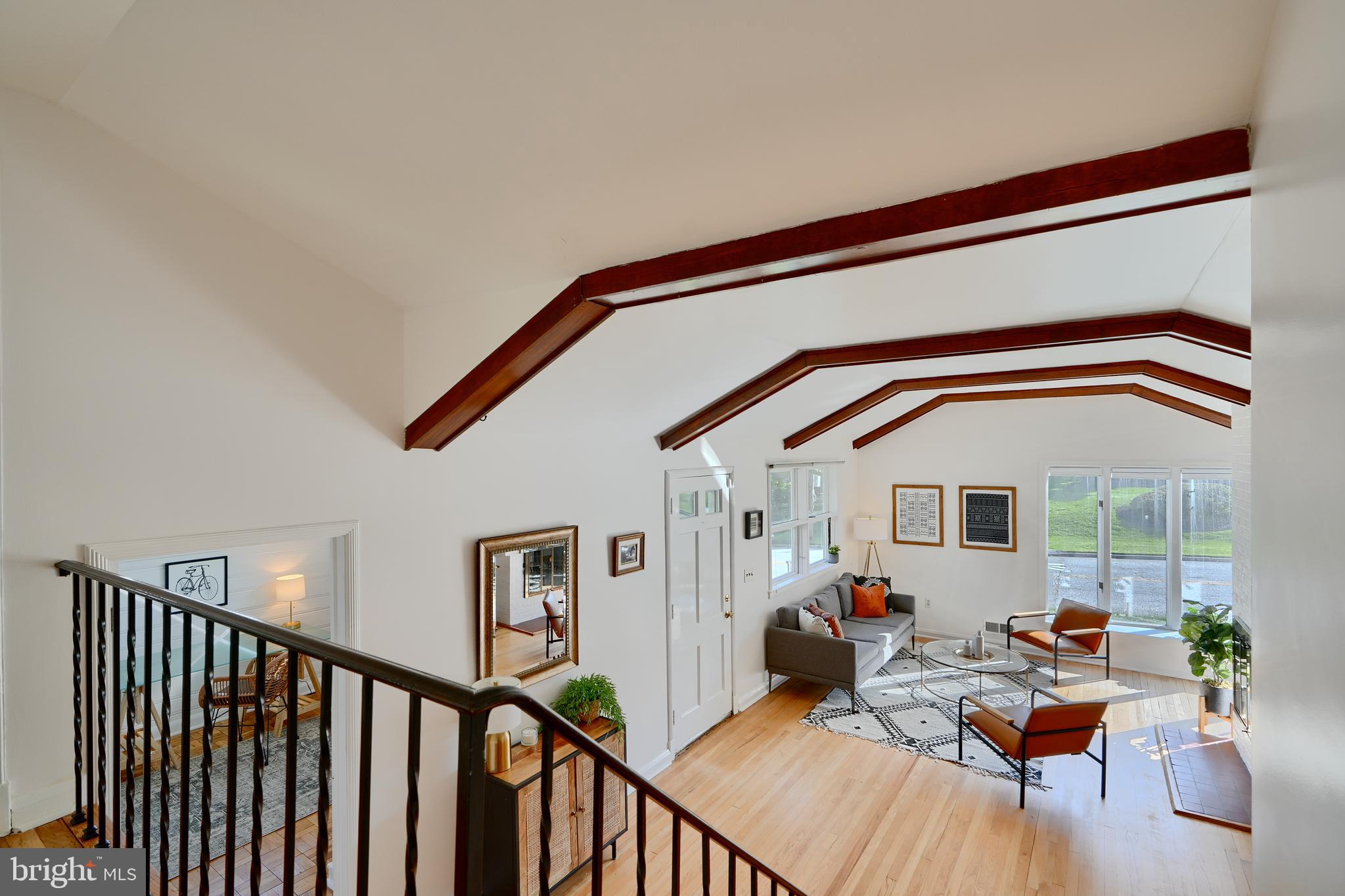 1316 Glendale Road Baltimore, MD 21239 - Photo 19 of 37 a living room with furniture and a flat screen tv