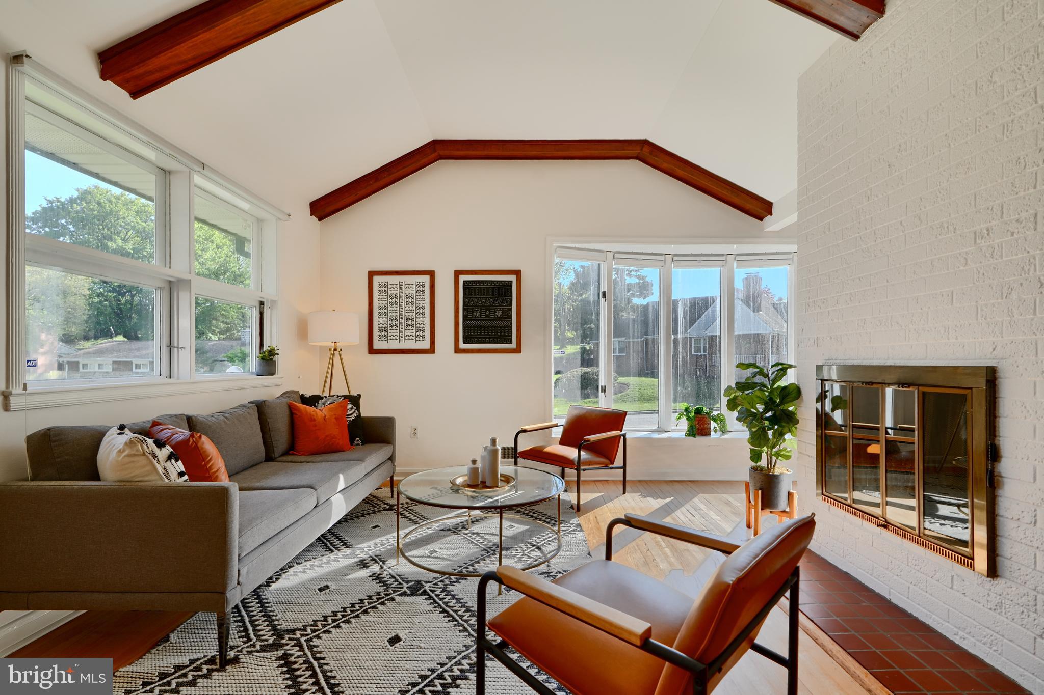 1316 Glendale Road Baltimore, MD 21239 - Photo 2 of 37 a living room with furniture a rug and a large window