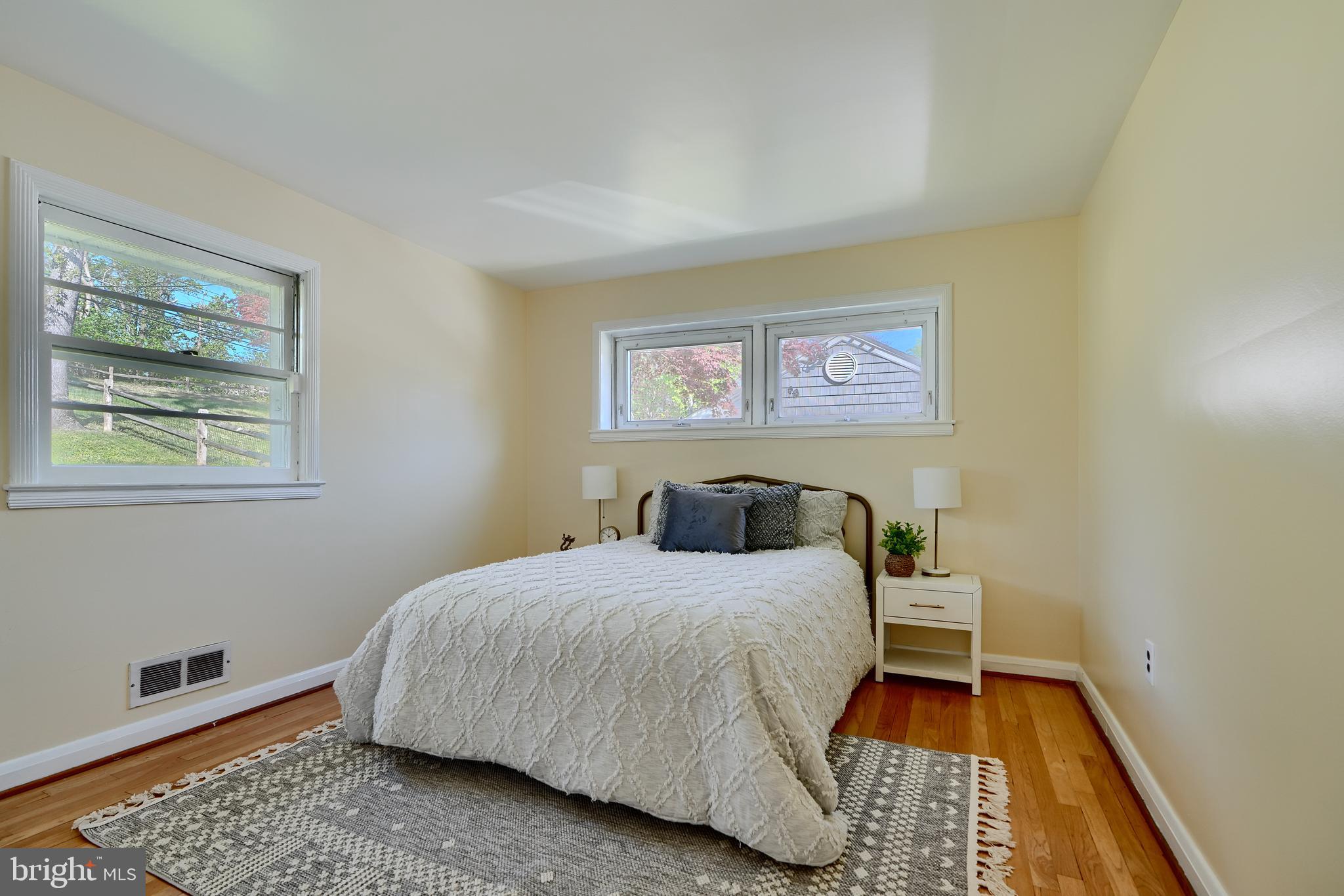 1316 Glendale Road Baltimore, MD 21239 - Photo 27 of 37 a bedroom with a bed and a window