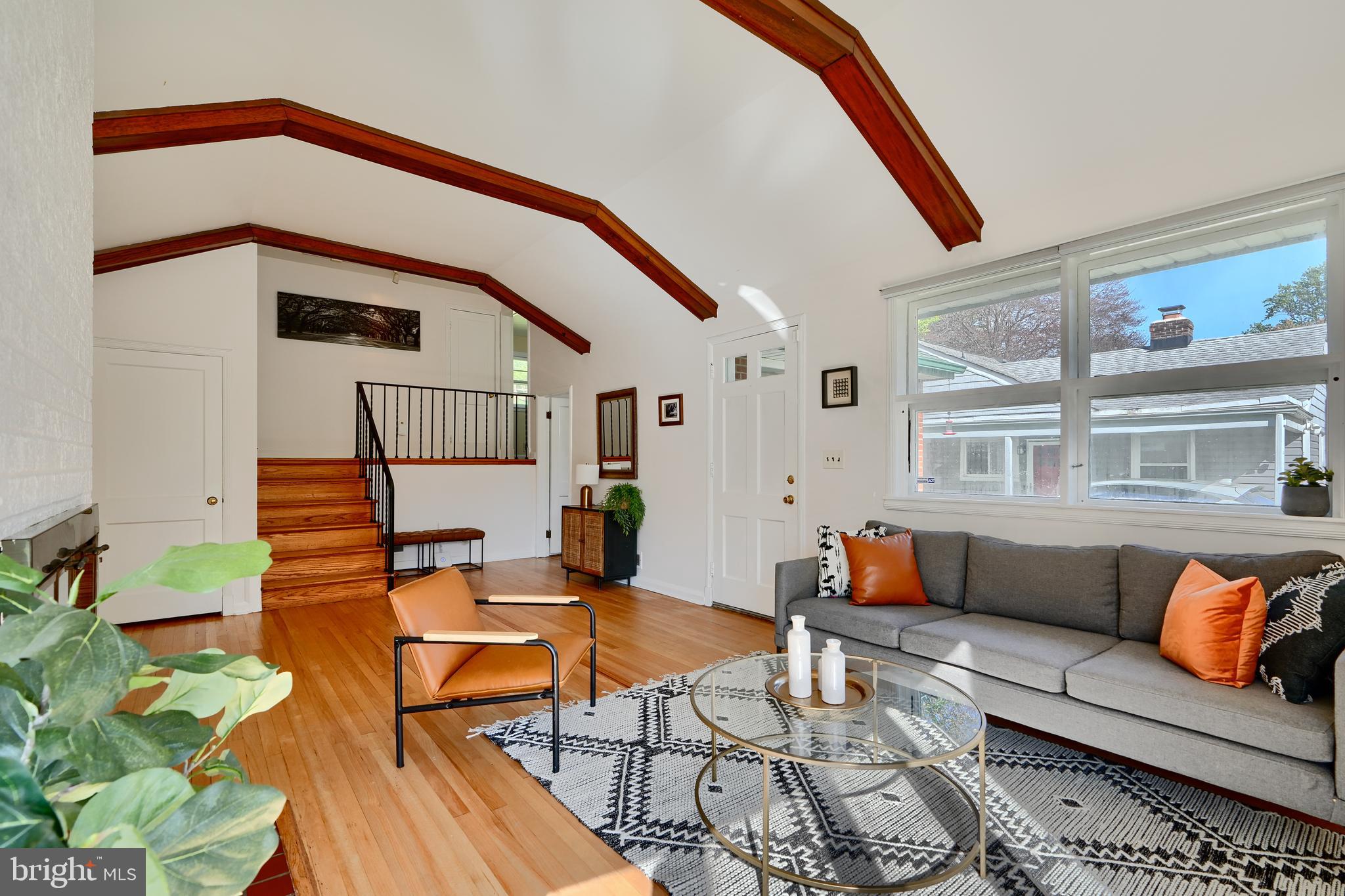 1316 Glendale Road Baltimore, MD 21239 - Photo 5 of 37 a balcony with furniture and wooden floor