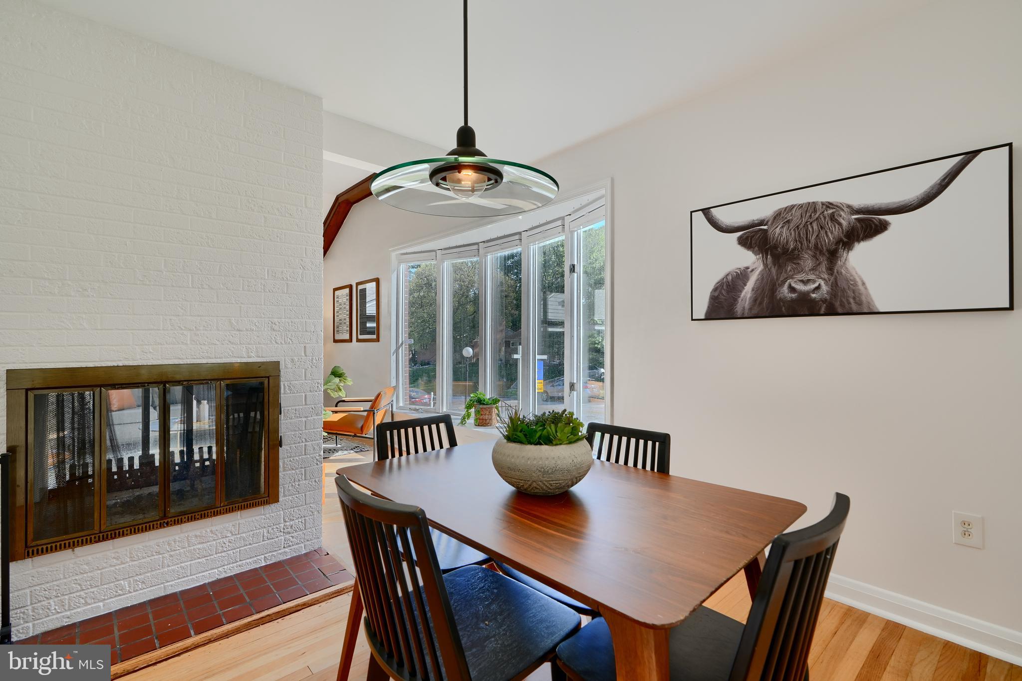 1316 Glendale Road Baltimore, MD 21239 - Photo 8 of 37 a view of a dining room with furniture window and wooden floor